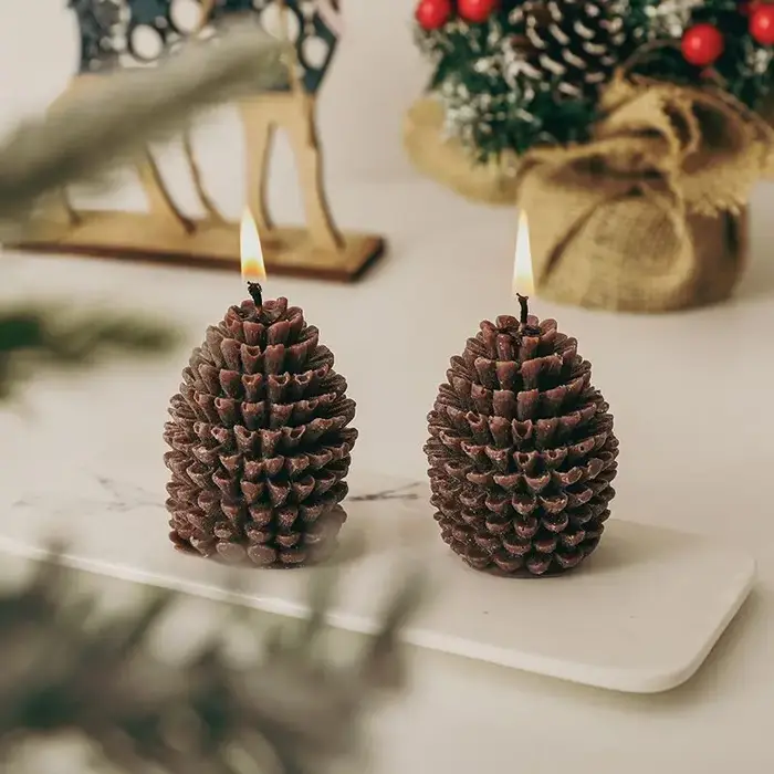 Bougies parfumées pomme de pin de noël